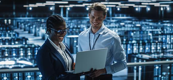 two people working in an it infrastructure